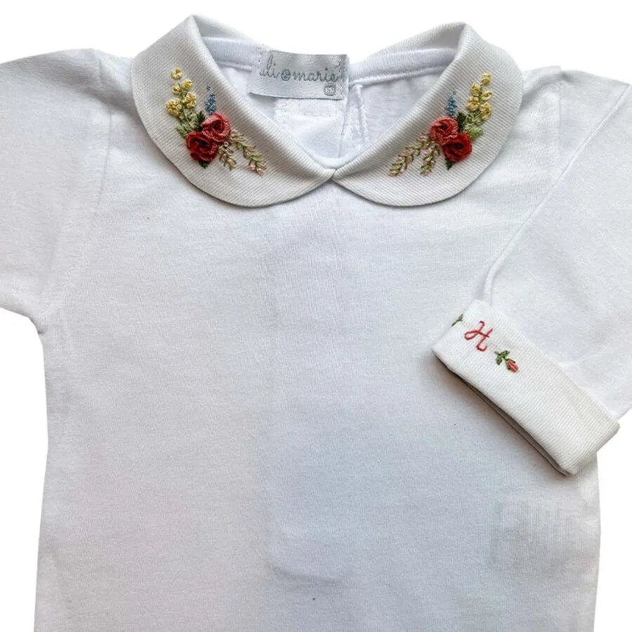 body anne branco de manga longa com gola redonda bordada com flores em tons de vermelho e rosa
