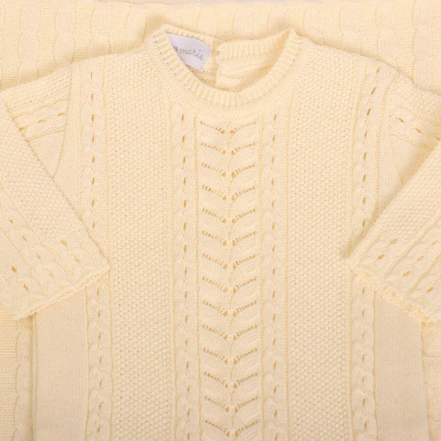 macacão firenze amarelo bebê de tricot com manga longa e detalhes de trama em zig zag