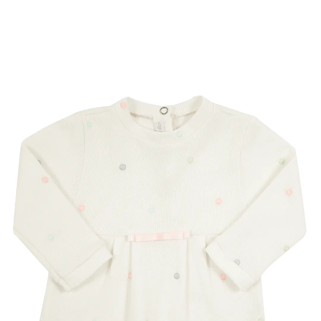 macacão paula off-white em algodão com estampa de poás coloridos e detalhe franzido na pala