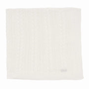 manta sorrento branca em tricô com ponto de trança em toda a peça e etiqueta discreta na parte inferior