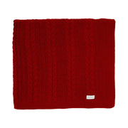 manta sorrento vermelha em tricô com padronagem de tranças verticais e acabamento em barra canelada