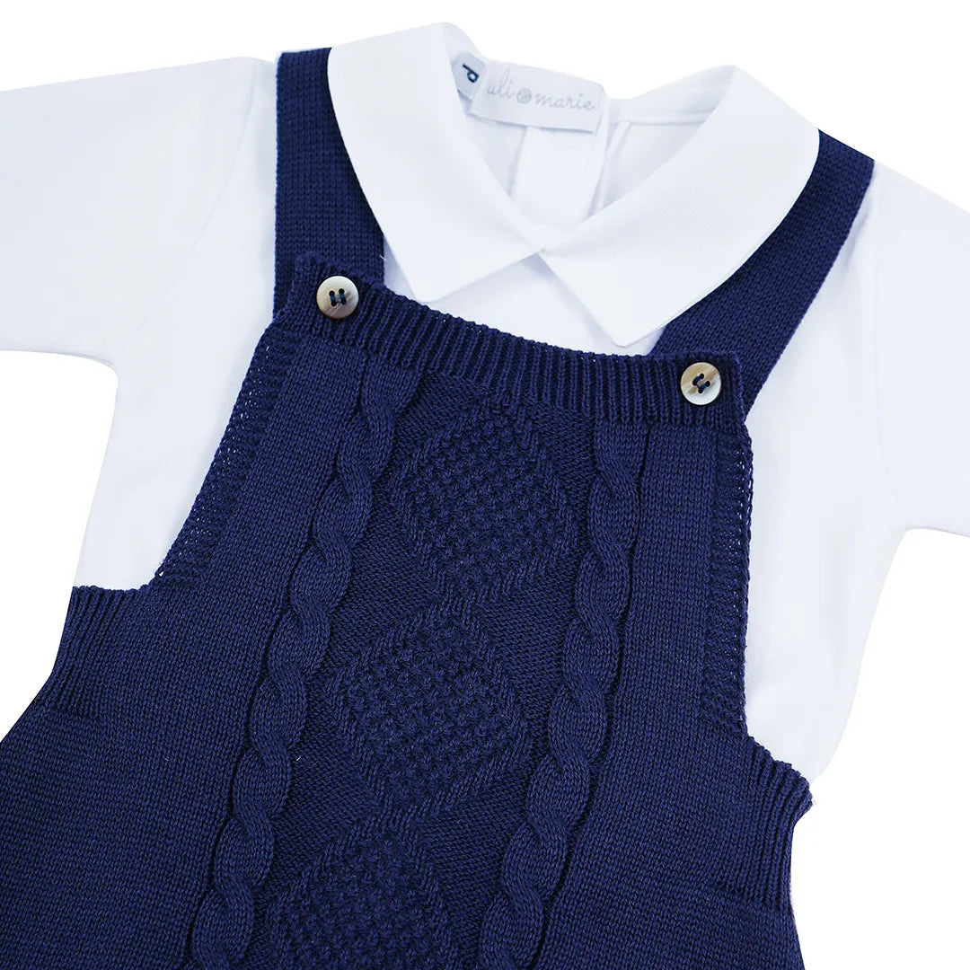 romper classic azul marinho de tricot trançado e curto, com botões decorativos e body branco de gola polo