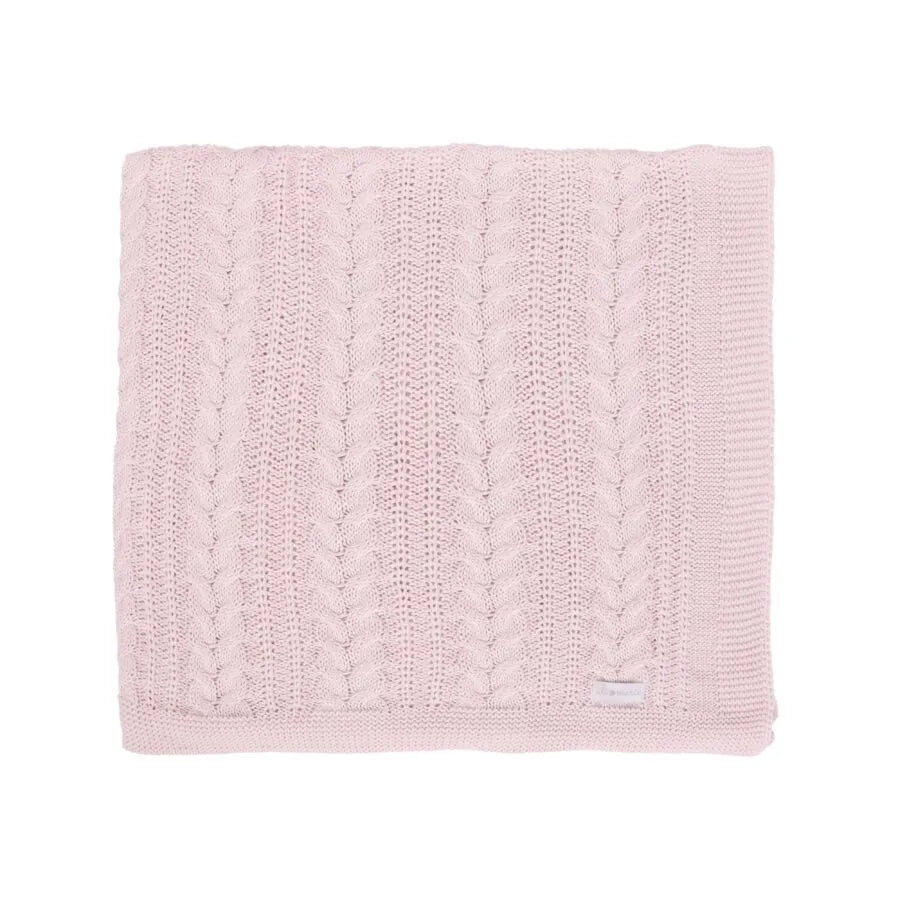 saída maternidade sorrento rosa bebê, macacão de tricot com manga longa e trama trançada sobre a manta